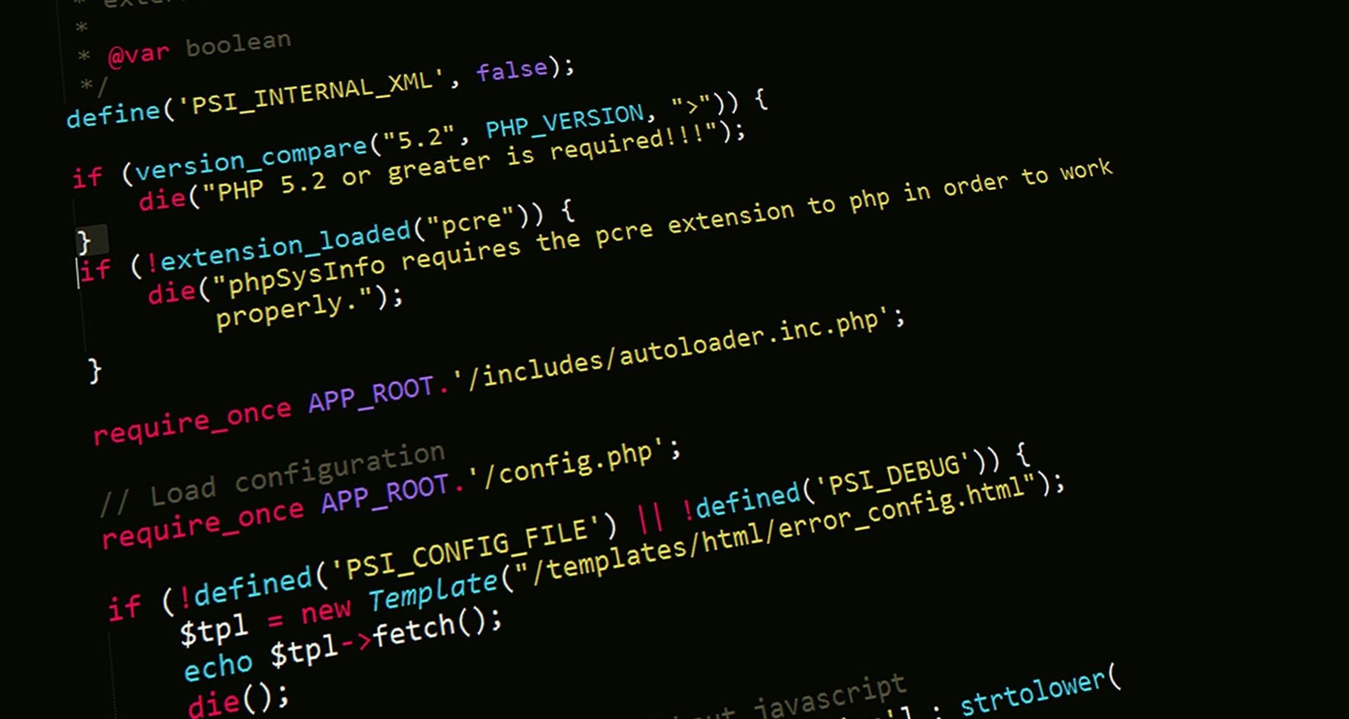 Close-up of PHP code with syntax highlighted in different colors on a dark background.