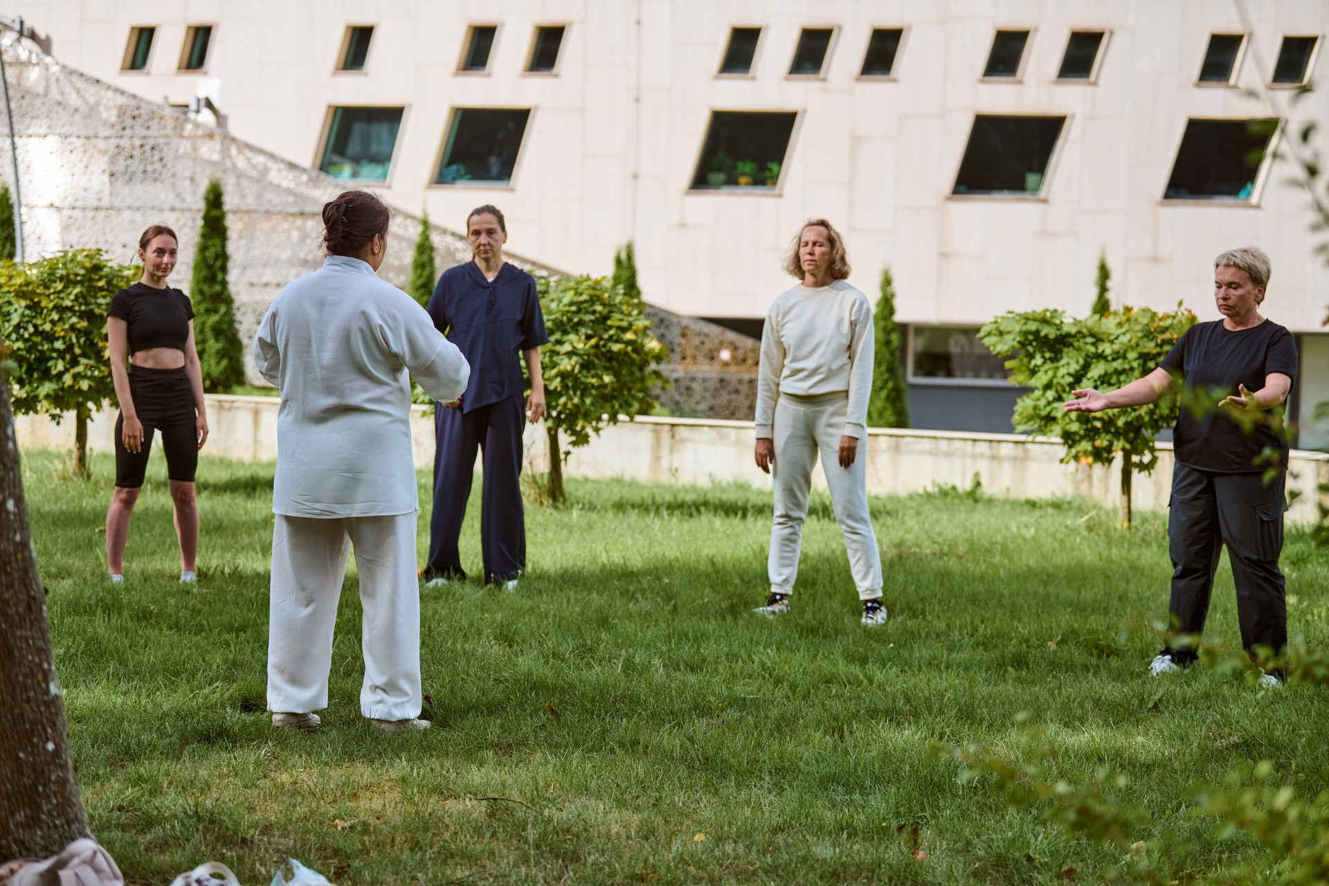 Outdoor qigong practice in urban park setting