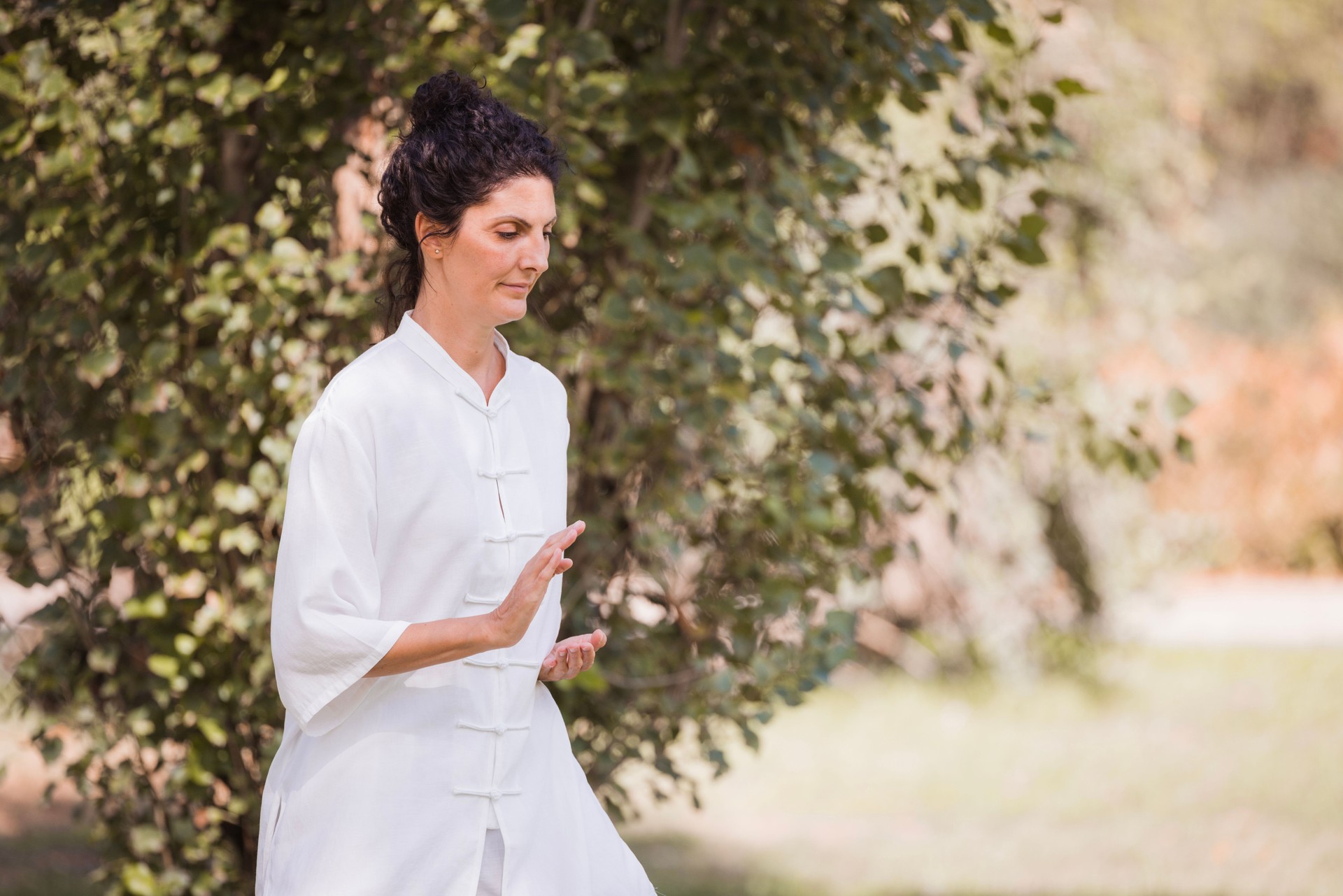 Woman exercising Qi Gong