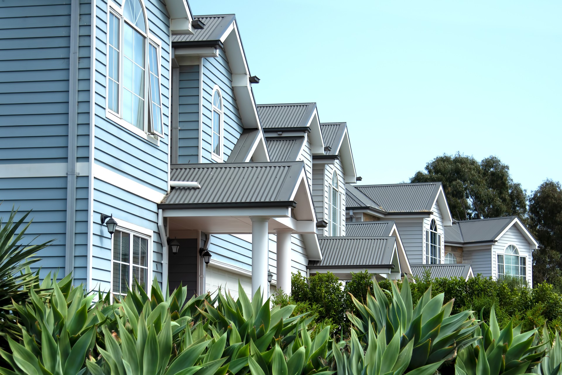 Frontal view of contemporary double story townhouses